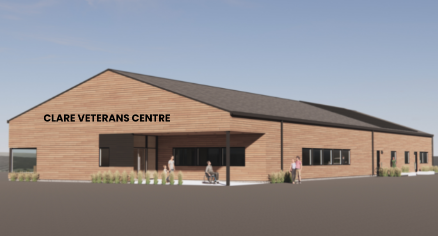 An image of the rendering drawing of the future Clare Veterans Centre. A rectangular shape building with wood finish. 